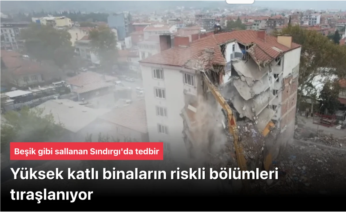 Sındırgı'da hasarlı yüksek binaların riskli bölümleri tıraşlanıyor